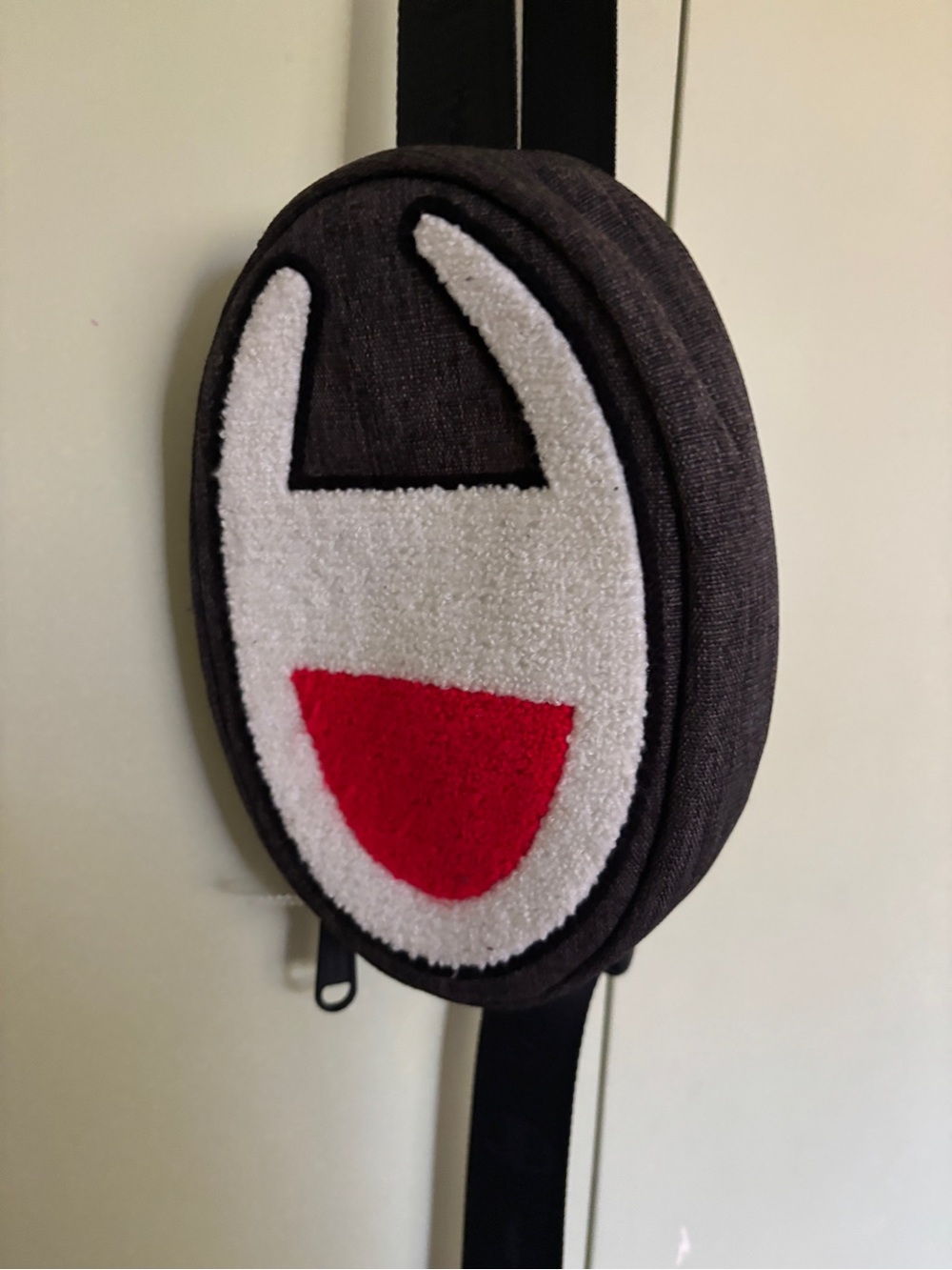 71. Champion Black Crossbody Bag with White and Red Patch